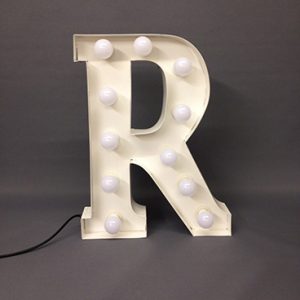 white marquee letter r