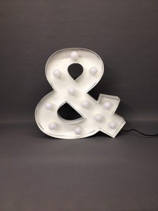 white ampersand carnival letter