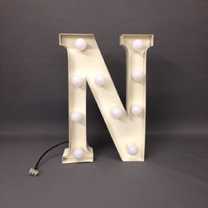 white marquee letter n
