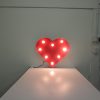 red steel handmade illuminated heart