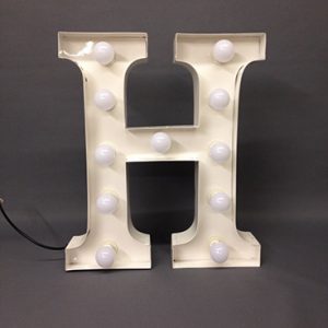 white h marquee letter